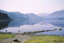 Morning mist in Derwentwater, towards the Jaws of Borrowdale Cumberland, 20th century. Artist: CM Dixon