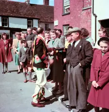 Morris man talking to onlookers, c1955. Creator: Arthur Charles Kirby Ware
