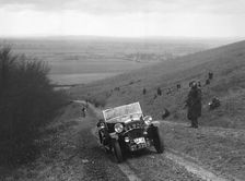 Morris Minor 2-seater competing in a trial, Crowell Hill, Chinnor, Oxfordshire, 1930s. Artist: Bill Brunell