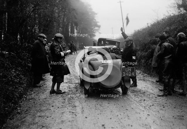 Morris Minor of KC McGuffie competing in the MCC Exeter Trial, Blackhill, Dorset, 1930. Artist: Bill Brunell.