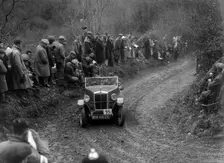 Morris Minor open 2-seater of HH Porter-Hargreaves competing in the MCC Lands End Trial, 1935. Artist: Bill Brunell