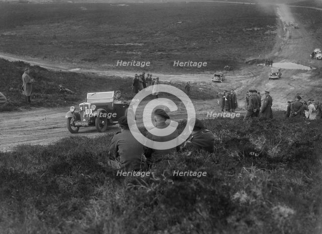 Morris Minor competing in a motoring trial, Bagshot Heath, Surrey, 1930s. Artist: Bill Brunell.