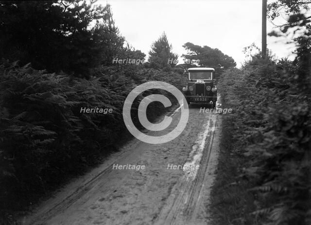Morris Minor taking part in a First Aid Nursing Yeomanry trial or rally, 1931. Artist: Bill Brunell.