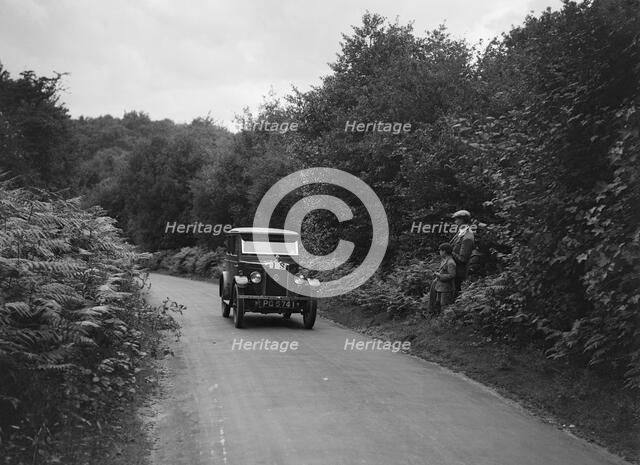 Morris Minor taking part in a First Aid Nursing Yeomanry trial or rally, 1931. Artist: Bill Brunell.