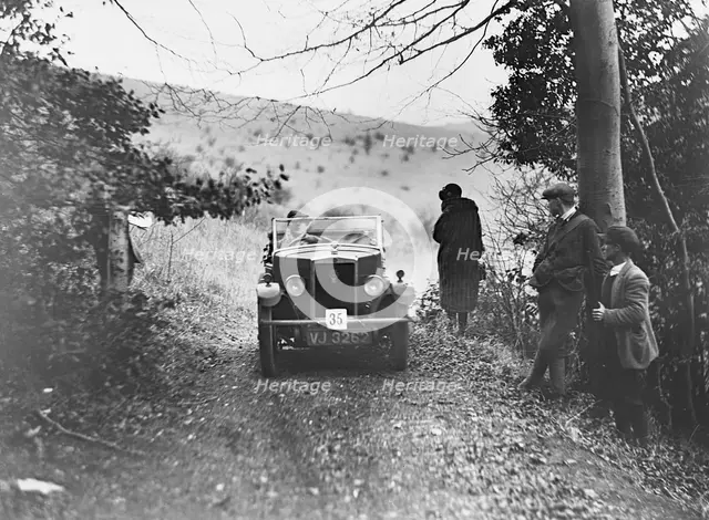 Morris Minor tourer of JE Clowes competing in the Inter-Varsity Trial, November 1931. Artist: Bill Brunell.