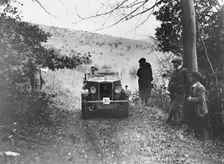 Morris Minor tourer of JE Clowes competing in the Inter-Varsity Trial, November 1931. Artist: Bill Brunell