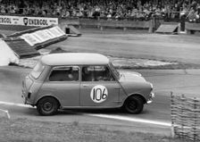 Morris Mini skidding at chicane, Goodwood 1961. Creator: Unknown