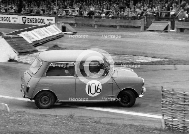Morris Mini skidding at chicane, Goodwood 1961. Creator: Unknown.