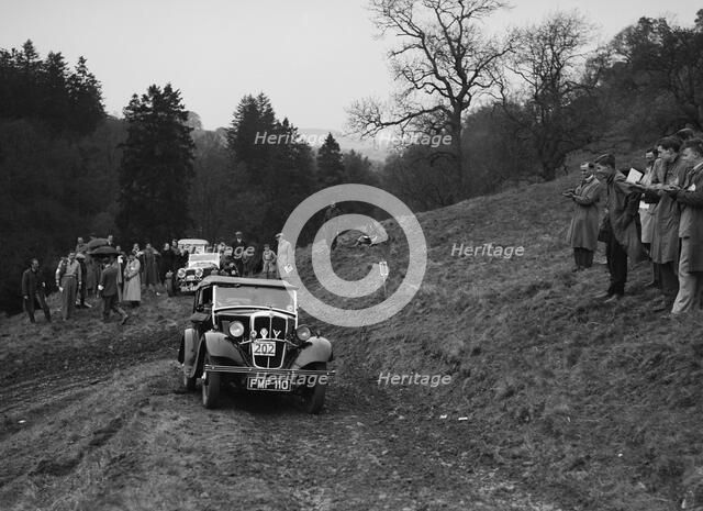 Morris of DCC Roberts competing in the MCC Edinburgh Trial, Roxburghshire, Scotland, 1938. Artist: Bill Brunell.