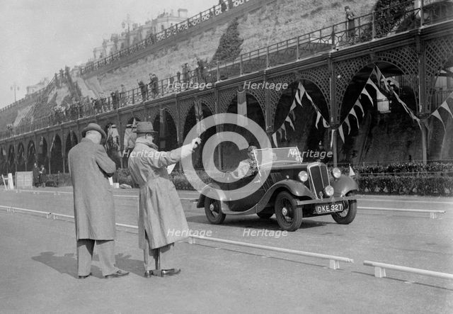 Morris open 2-seater of MC Browning on Madeira Drive, Brighton, RAC Rally, 1939. Artist: Bill Brunell.
