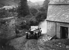 Morris or MG 14/28 of MH Fortlage competing in the JCC Lynton Trial, 1932. Artist: Bill Brunell