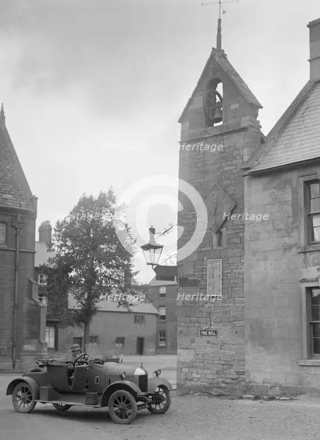Morris Bullnose outside the fire station, Chipping Norton, Oxfordshire, 1920s. Artist: Bill Brunell.