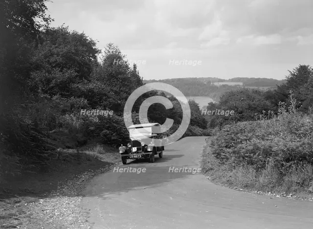 Morris Cowley Tourer taking part in a First Aid Nursing Yeomanry trial or rally, 1931. Artist: Bill Brunell.