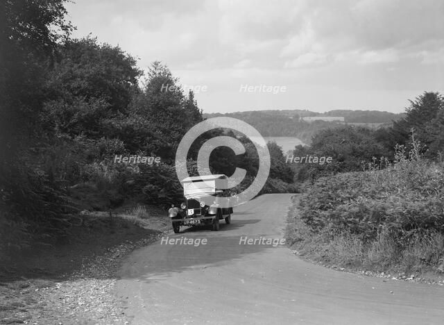 Morris Cowley Tourer taking part in a First Aid Nursing Yeomanry trial or rally, 1931. Artist: Bill Brunell.