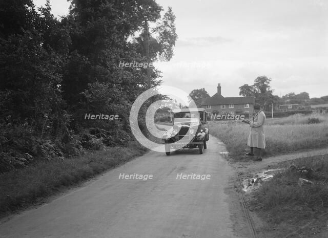 Morris Cowley Tourer taking part in a First Aid Nursing Yeomanry trial or rally, 1931. Artist: Bill Brunell.
