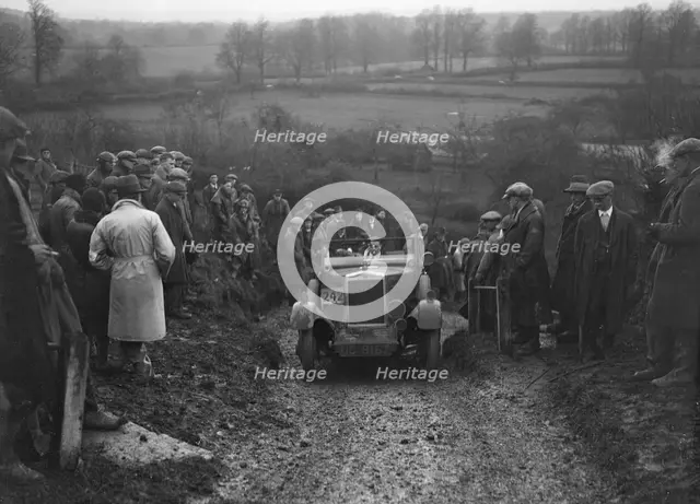 Morris Cowley of RJ Barker competing in the MCC Exeter Trial, Ibberton Hill, Dorset, 1930. Artist: Bill Brunell.