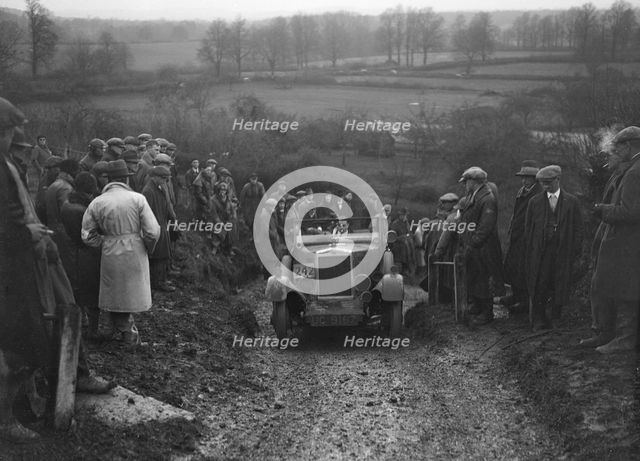 Morris Cowley of RJ Barker competing in the MCC Exeter Trial, Ibberton Hill, Dorset, 1930. Artist: Bill Brunell.