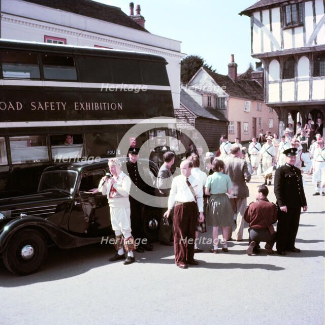 Morris dancers and policemen at a road safety exhibition, Essex, c1955.  Creator: Arthur Charles Kirby Ware.
