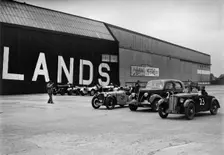 Morris, Ford V8 and MG PA Midget cars at the MCC Members Meeting, Brooklands, 10 September 1938. Artist: Bill Brunell