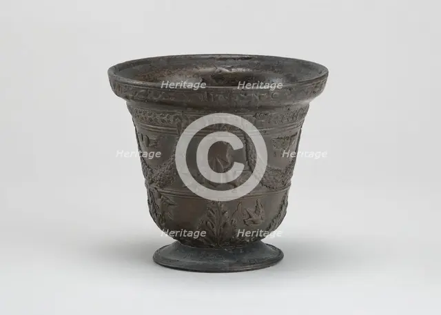 Mortar with Birds, Cherubim, Armorial Shield, and Festoons, early 16th century. Creator: Unknown.