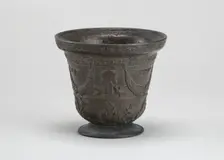 Mortar with Birds, Cherubim, Armorial Shield, and Festoons, early 16th century. Creator: Unknown
