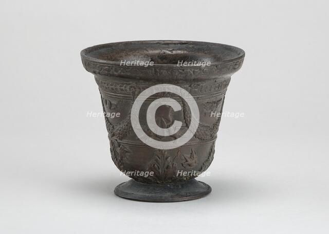 Mortar with Birds, Cherubim, Armorial Shield, and Festoons, early 16th century. Creator: Unknown.