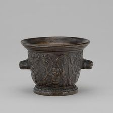 Mortar with Foliate Grotesques, Goats Heads, and Ribbed Handles, mid 16th century. Creator: Unknown