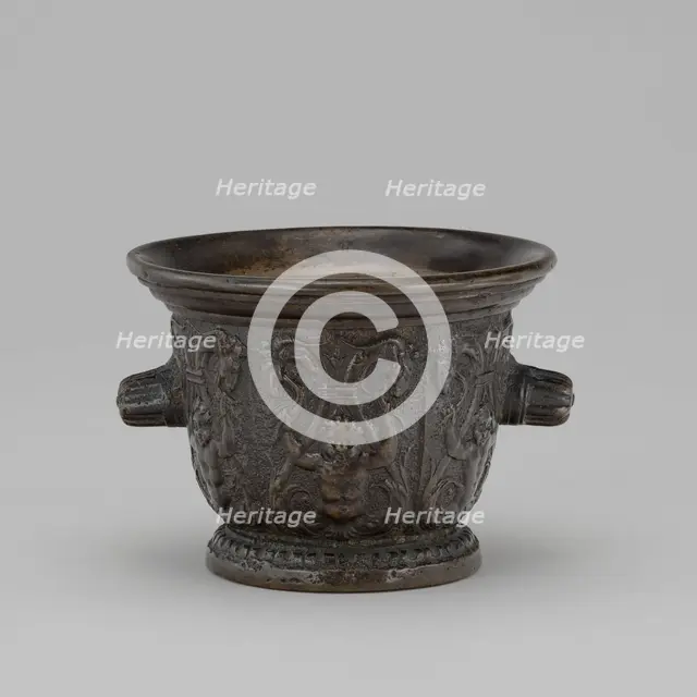 Mortar with Foliate Grotesques, Goats' Heads, and Ribbed Handles, mid 16th century. Creator: Unknown.