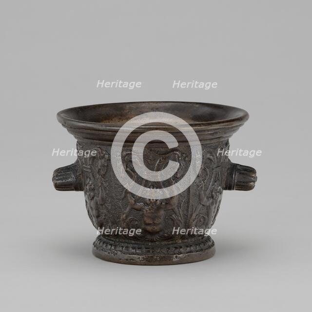 Mortar with Foliate Grotesques, Goats' Heads, and Ribbed Handles, mid 16th century. Creator: Unknown.