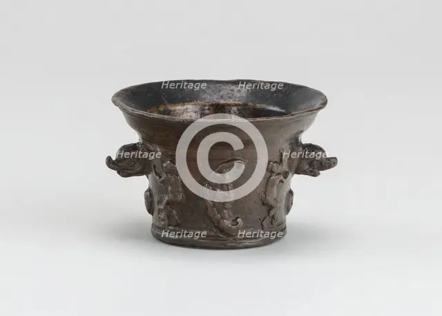 Mortar with Sun, Moon, and Dolphin-shaped Handles, early 16th century. Creator: Unknown.