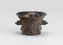 Mortar with Sun, Moon, and Dolphin-shaped Handles, early 16th century. Creator: Unknown