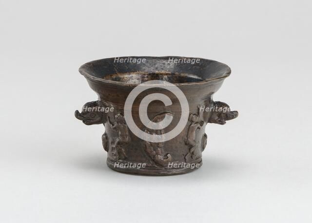 Mortar with Sun, Moon, and Dolphin-shaped Handles, early 16th century. Creator: Unknown.