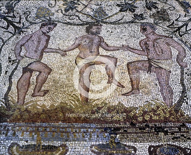 Mosaic in the Amphitheatre house representing treading grapes, preserved in the archaeological si…