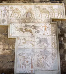 Mosaic with camel caravan and hunting and agricultural works, Roman Theatre, Bosra, Syria, (2001). Creator: LTL