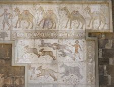 Mosaic with camel caravan and hunting (dogs chasing hare), Roman Theatre, Bosra, Syria, (2001). Creator: LTL