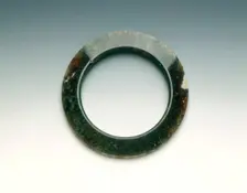 Moss-green agate pectoral ring, Warring States Period, China, 475-221 BC. Creator: Unknown