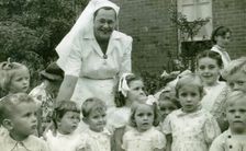 Matron Joan Gardner and children at St Monan's Hospital, 1952. Creator: Unknown