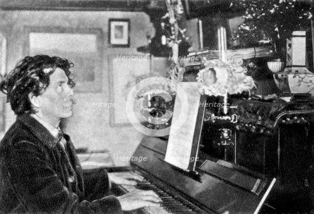 Maurice Rollinat, French poet, playing the piano, 1902. Artist: Unknown