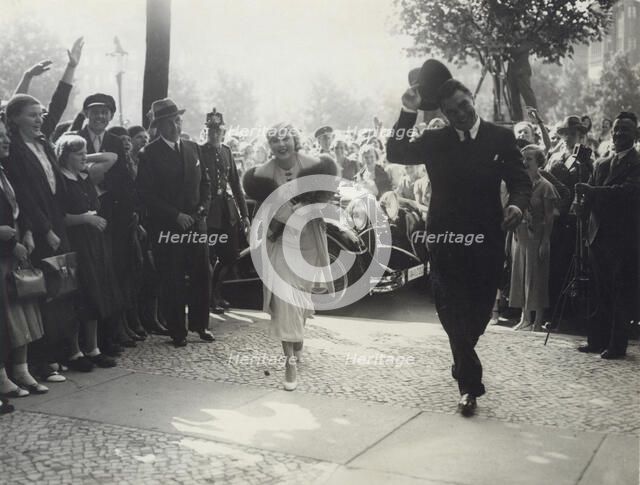 Max Schmeling and Anny Ondra arrive at the registry office to be married, 1933. Artist: Unknown