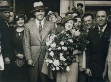 Max Schmeling and Anny Ondra arrive in Barcelona, Spain, 1933. Creator: Unknown