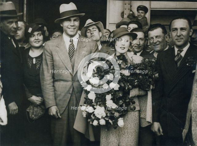 Max Schmeling and Anny Ondra arrive in Barcelona, Spain, 1933.   Creator: Unknown.
