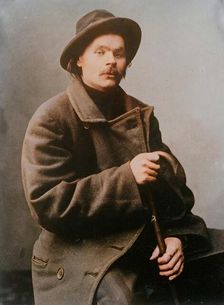 Maxim Gorky, seated with heavy coat on, 1910. Creator: Bain News Service