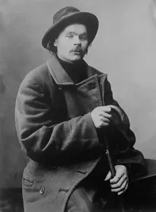 Maxim Gorky, seated with heavy coat on, 1910. Creator: Bain News Service