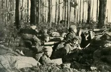 Maxim gun in action on the British Front First World War, 1915, (c1920). Creator: Unknown