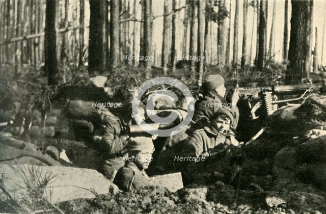 'Maxim gun in action on the British Front', First World War, 1915, (c1920). Creator: Unknown.