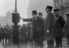 Mayor Gaynor turning in alarm 3/20/13, 1913. Creator: Bain News Service