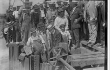 Mayor Mitchel opens gates, between c1915 and c1920. Creator: Bain News Service