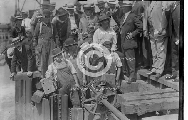 Mayor Mitchel opens gates, between c1915 and c1920. Creator: Bain News Service.