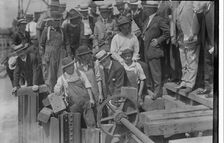 Mayor Mitchel opens gates, between c1915 and c1920. Creator: Bain News Service