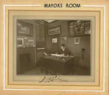 Mayor's Room; Frank G Pursell, Mayor 1939-1940 is pictured at his desk in the Mayor's room in 1939. Creator: Unknown